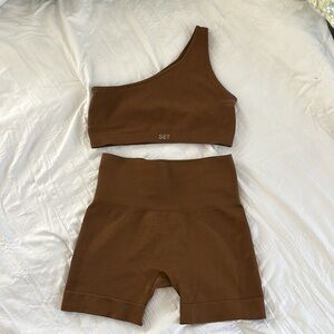 Size small in both. Perfect condition, the shorts are just too tight on me.